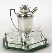 An Art Deco Roberts & Belk silver plated cocktail shaker, circa 1930 with unusual bayonet cap and