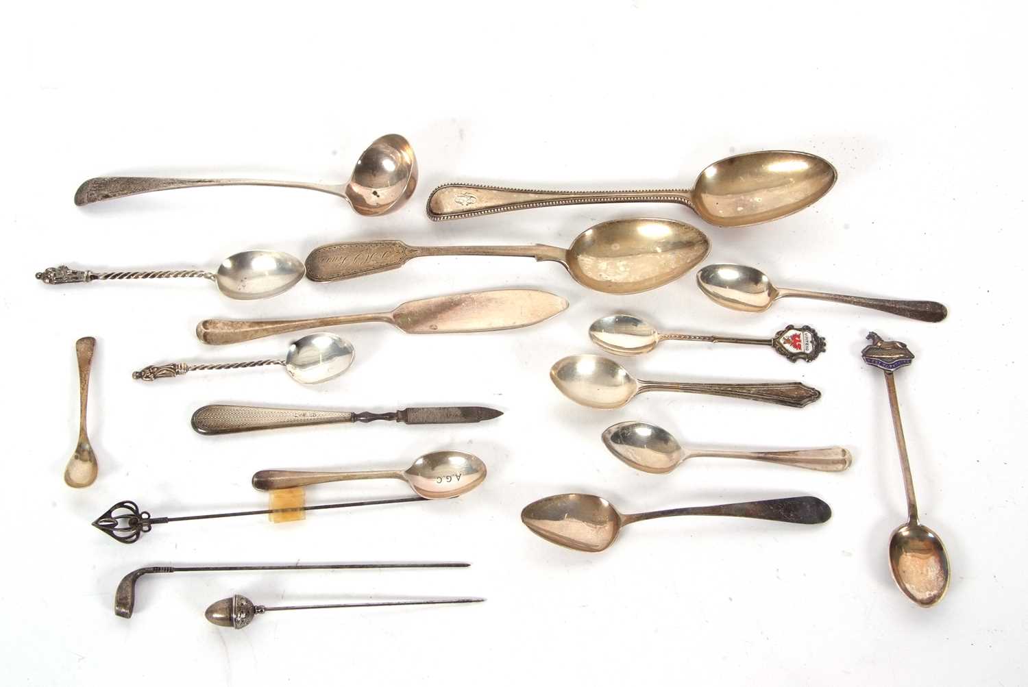 Mixed Lot: Two Victorian dessert spoons, a Georgian long handle toddy ladle, eight silver teaspoons,