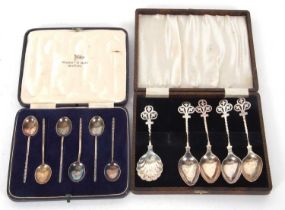 Mixed Lot: A cased set of four Victorian silver teaspoons with twisted stems and pierced leaf