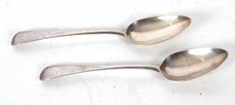 A pair of George III silver tablespoons both engraved with a griffin, London 1787, makers mark for
