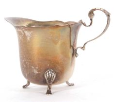 A George VI silver cream jug hallmarked for London 1937, makers mark for Blackmore & Fletcher Ltd,