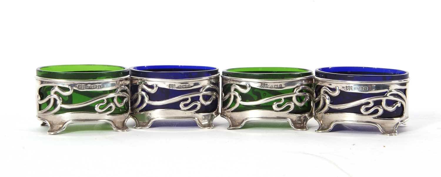 A set of four Art Nouveau silver salts of oval form, pierced with a vine tendril design, supported - Image 2 of 2