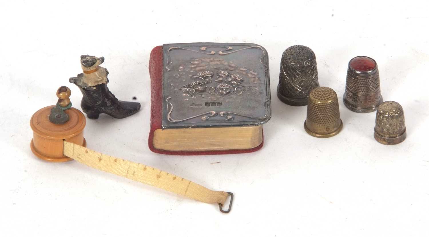 Mixed Lot: A silver fronted small prayer book, hallmarked for Birmingham 1938, two hallmarked silver