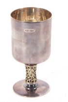 An Elizabeth II silver goblet having a plain bowl on a pierced silver gilt stem to a circular