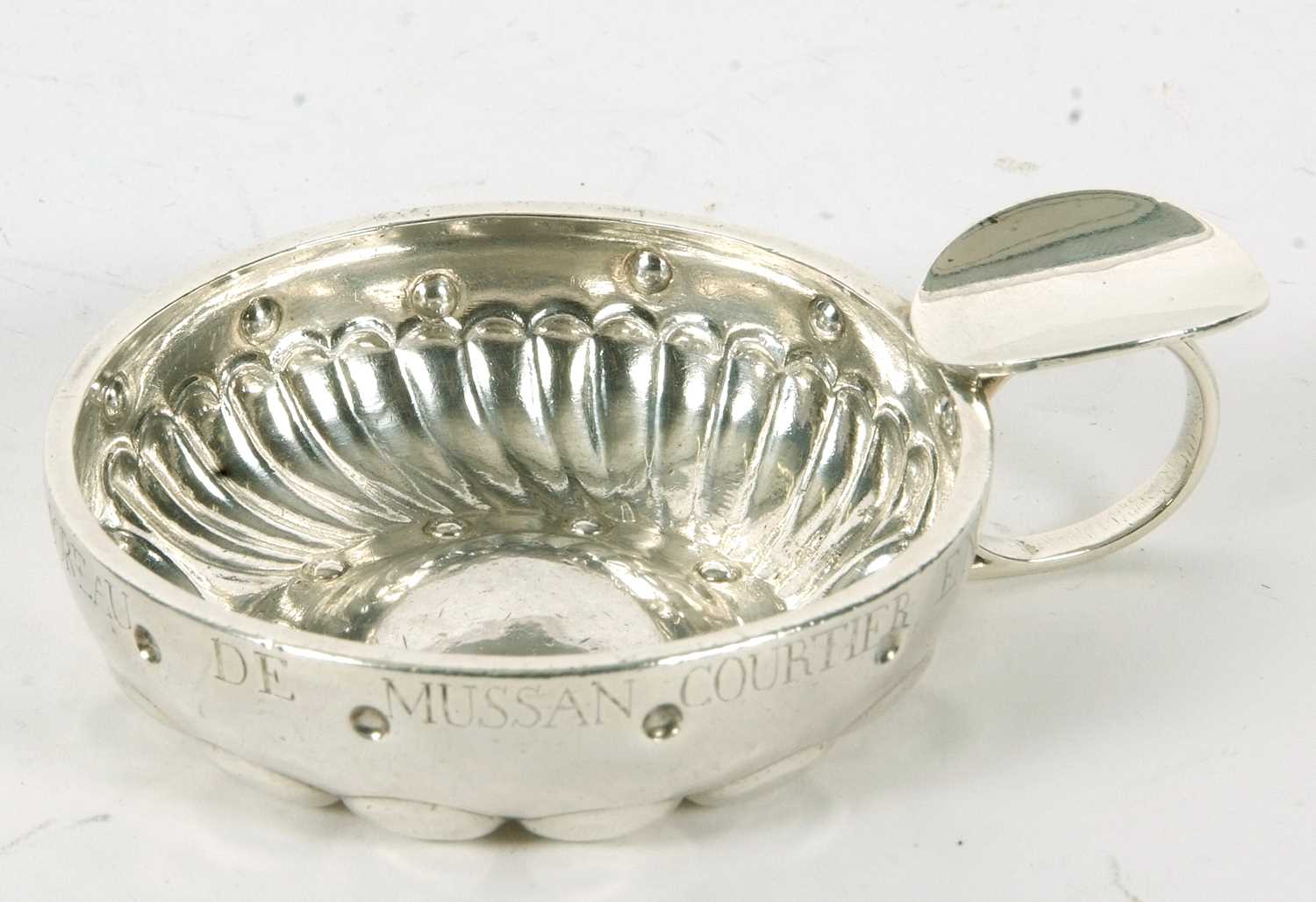 A French white metal wine taster, circa 1870, the bowl embossed with waves and bubbles having - Image 6 of 6