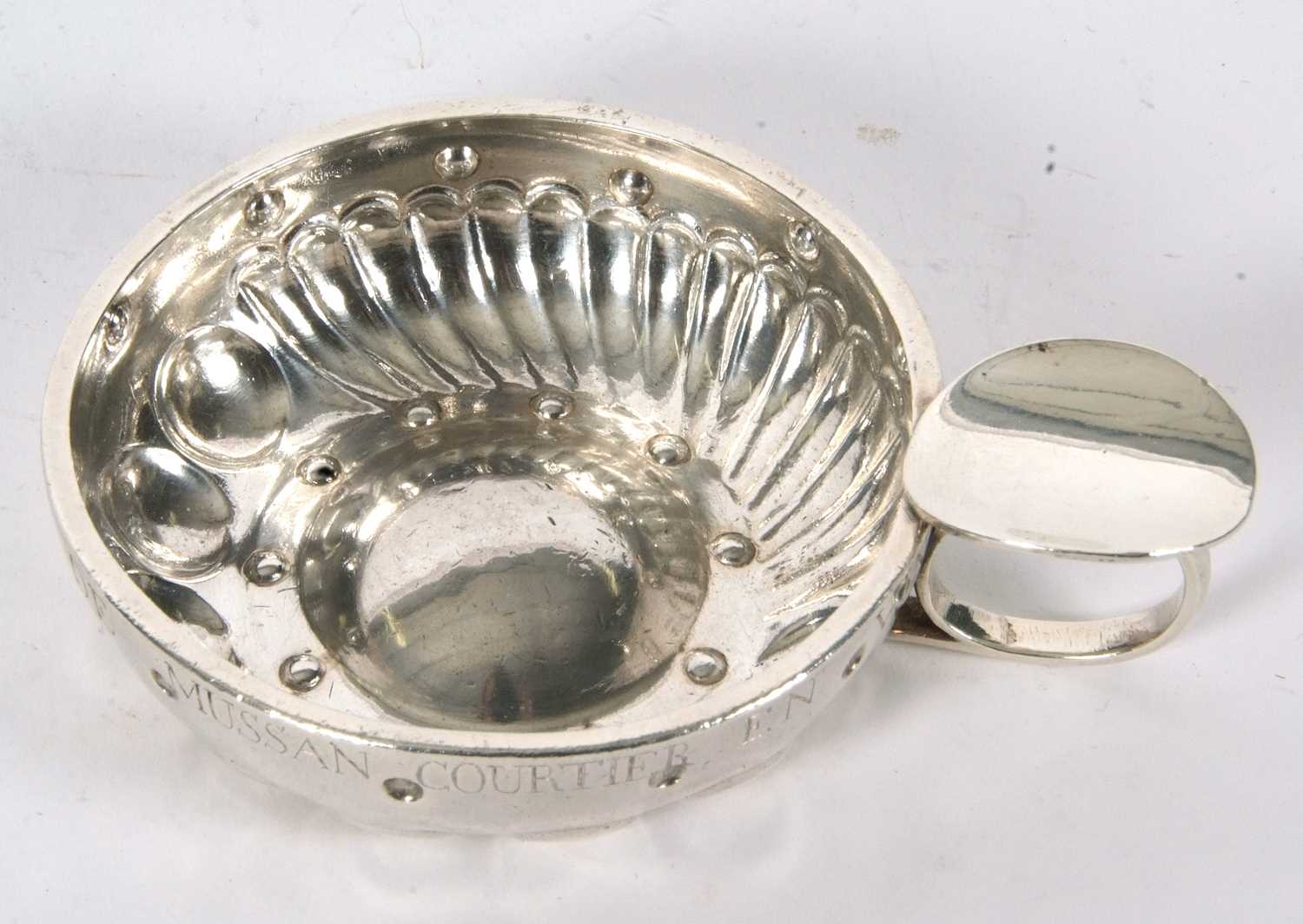 A French white metal wine taster, circa 1870, the bowl embossed with waves and bubbles having - Image 5 of 6