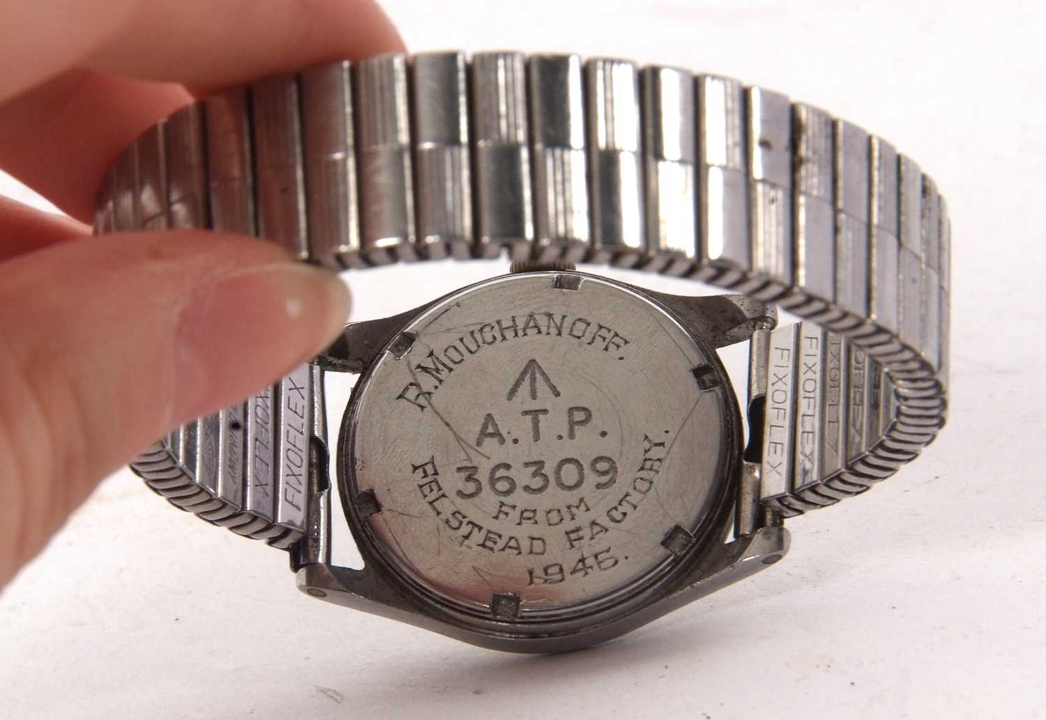 A vintage gents military wristwatch, the watch has a stainless steel case and expanding bracelet, it - Image 4 of 5