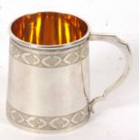 George III silver christening mug of tapering form, having a box shaped handle with two chased and