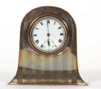 A George V novelty silver framed pocket watch holder in the form of a mantel clock, metal backed and