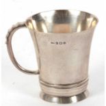 George VI small silver tankard of plain form with reeded detail supported on a collett foot,