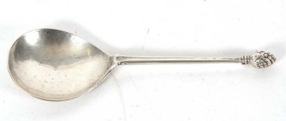 A mid 17th Century Norwegian silver baptism spoon having an oval rounded bowl, tapering reeded