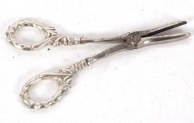 A pair of Edwardian silver handled grape shears, the silver framed handles hallmarked Birmingham