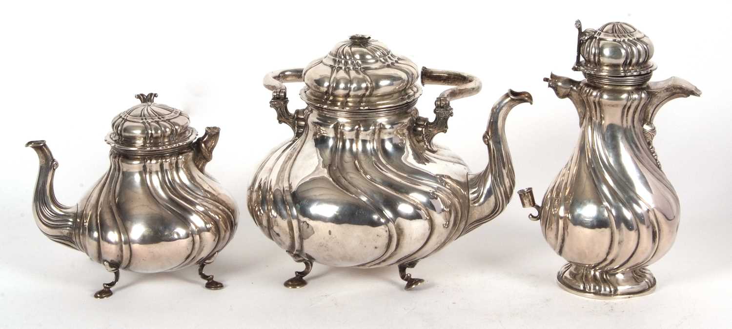 A 19th Century German white metal tea set comprising a large coffee pot, teapot, hot water kettle, - Image 2 of 9