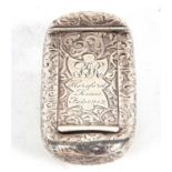 An Edwardian silver snuff box with rectangular body with a slightly curved profile, chased and