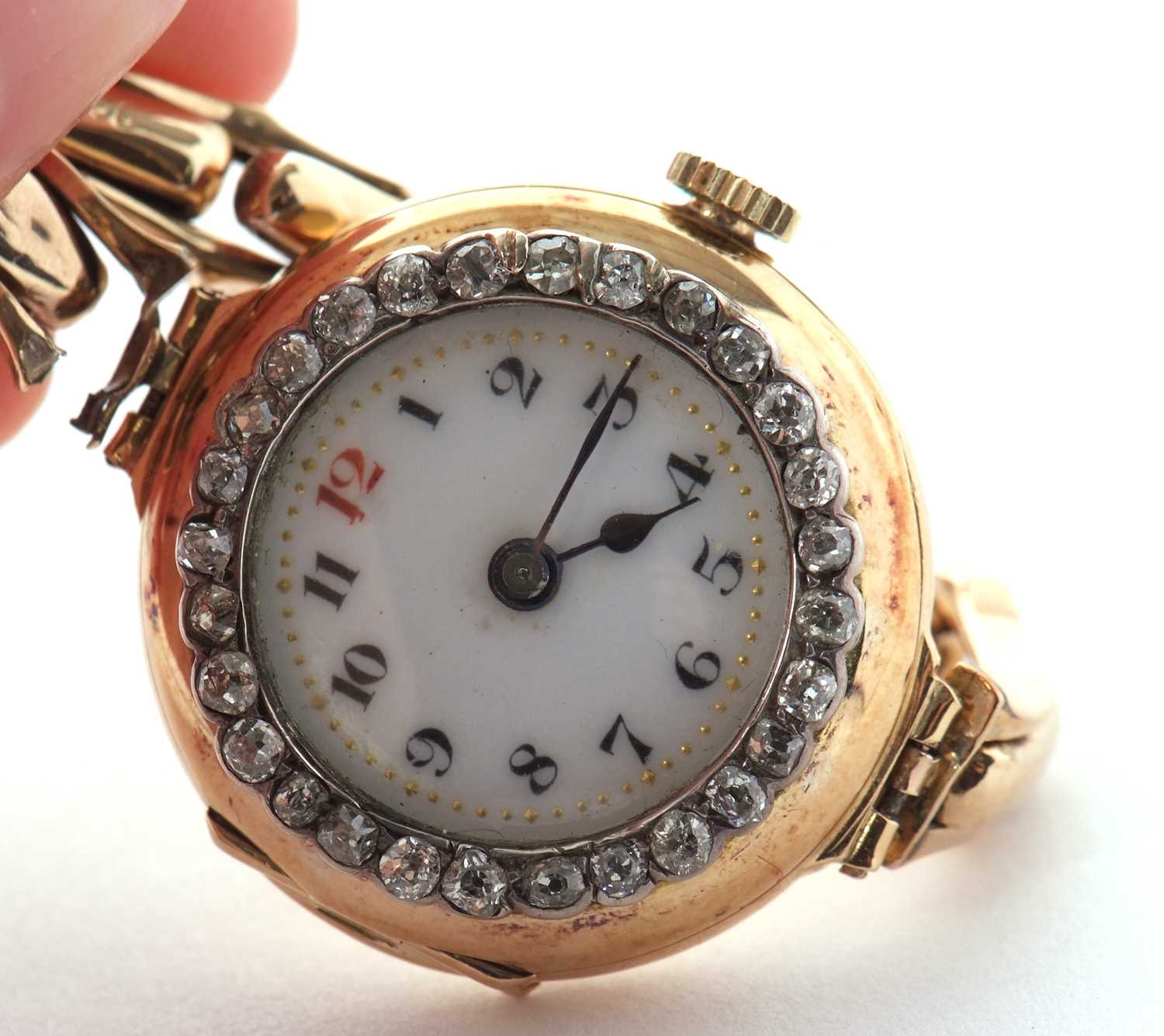 An 18ct gold cased ladies wristwatch with a diamond surrounded bezel and yellow metal expanding - Image 4 of 7