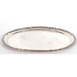 A large German 800 marked oval tray of plain form with applied reeded scallop border, 53 x 48cm, 2.