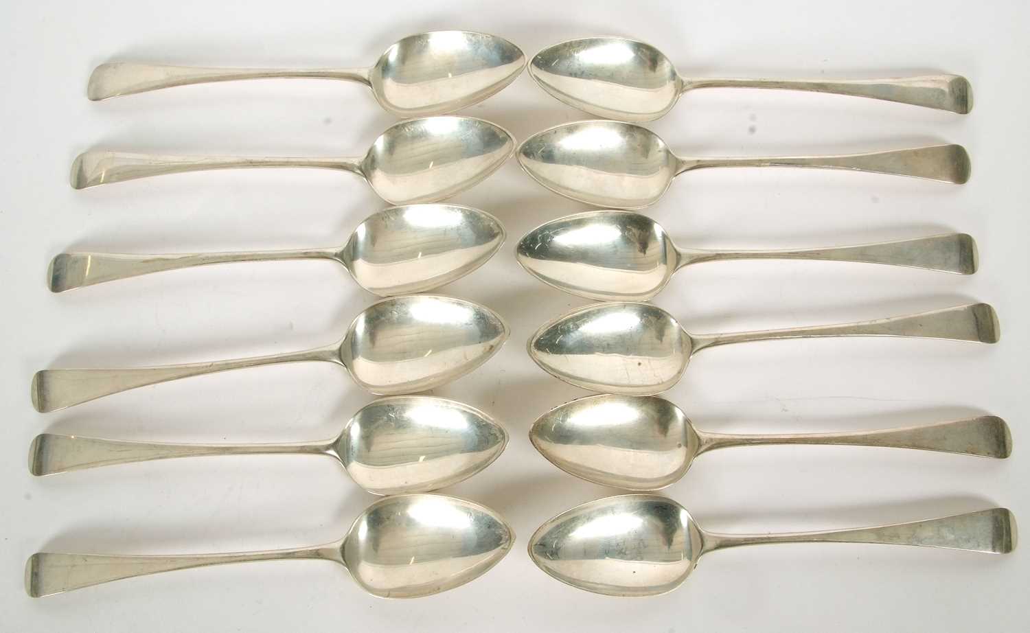 Twelve Old English pattern George IV silver table spoons, London 1811, makers mark for Peter &