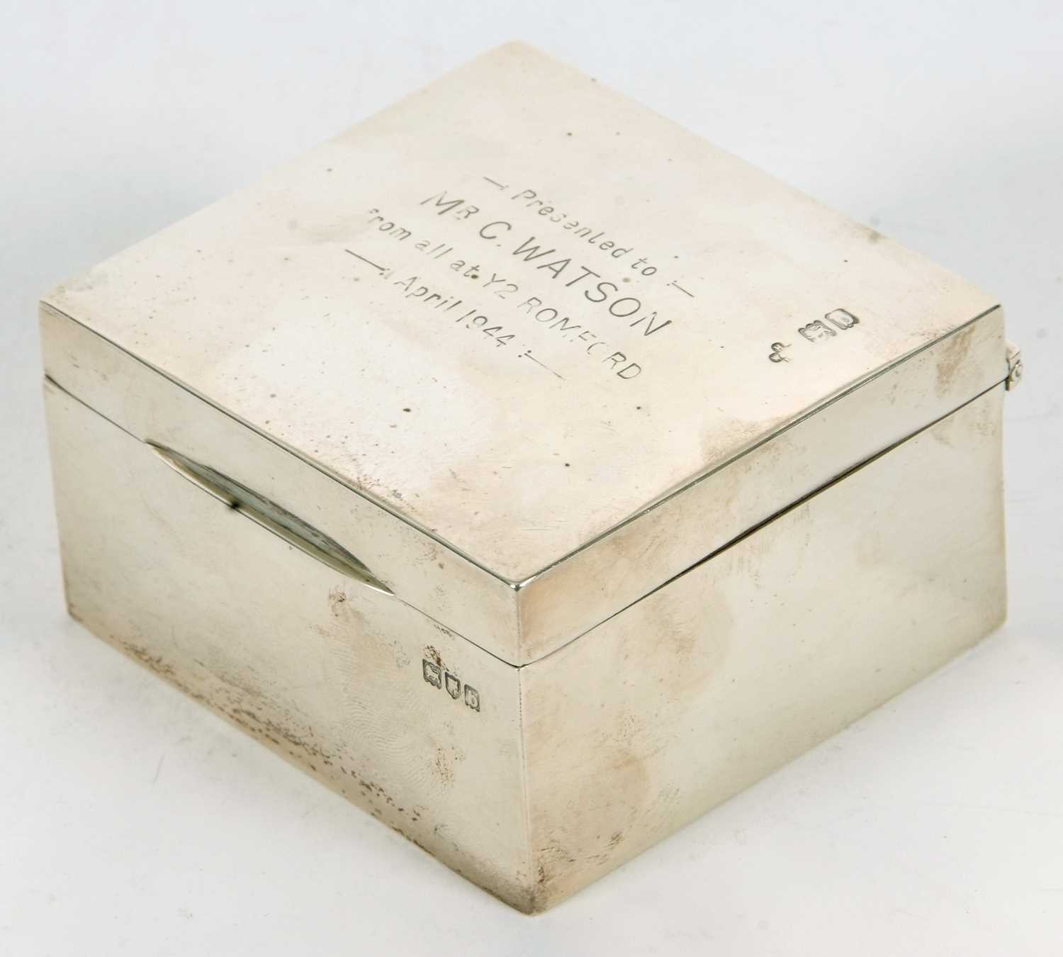A late Victorian silver table cigarette box of square form, the lid with presentation engraving, - Image 2 of 3