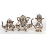 A 19th Century German white metal tea set comprising a large coffee pot, teapot, hot water kettle,