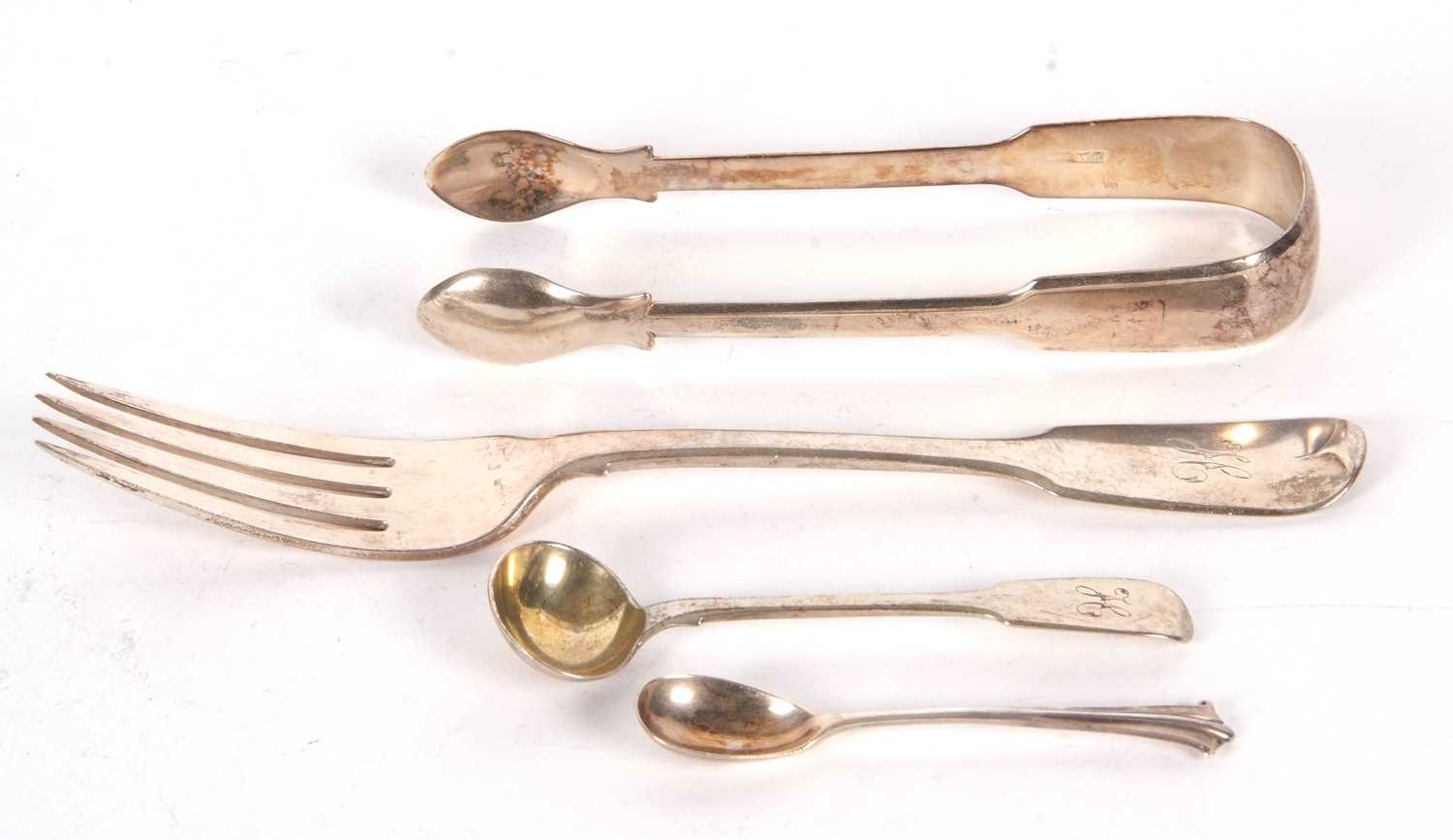 A George IV silver fiddle pattern table fork, London 1829, makers mark for Barak Mewburn, a pair