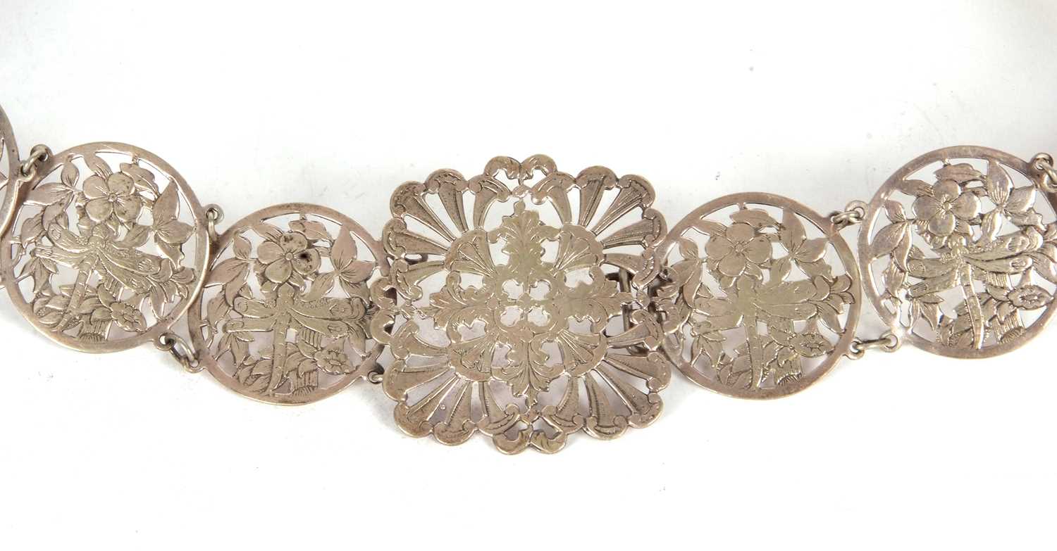 A vintage EPNS belt comprising sixteen circular pierced floral links to a square floral buckle, 68cm - Image 2 of 5