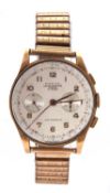 A yellow metal Maxor chronograph Suisse gents wristwatch, the case back is stamped on the inside 18k