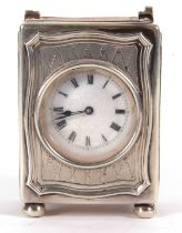 A George V silver cased boudoir carriage clock, the clock has a white enamel dial, black Roman