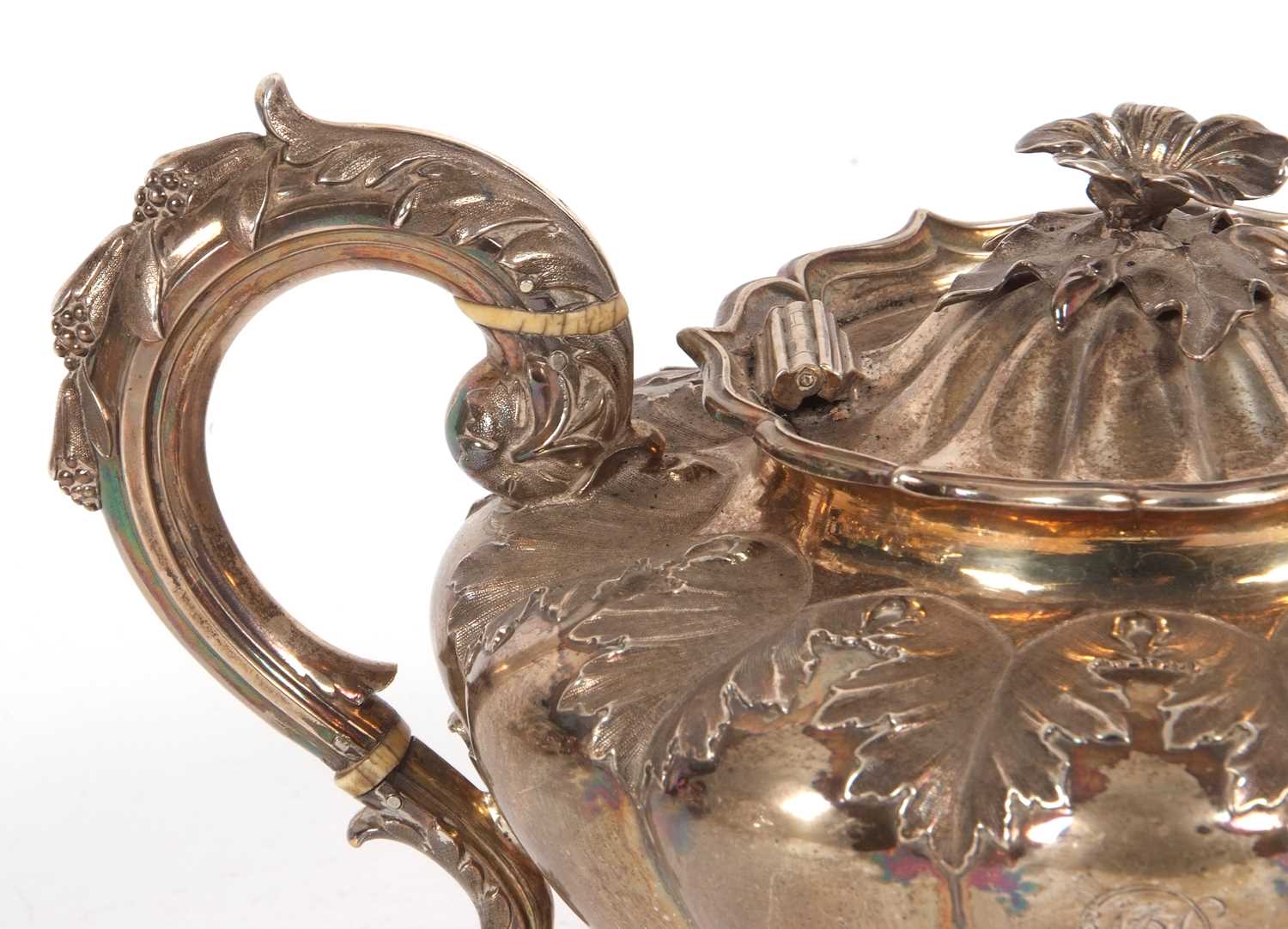 A William IV melon shaped teapot with leaf scroll handle and flower head finial, fluted body with - Image 2 of 4
