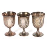 A group of three Victorian goblets each decorated with the Lily of the Valley pattern hallmarked for