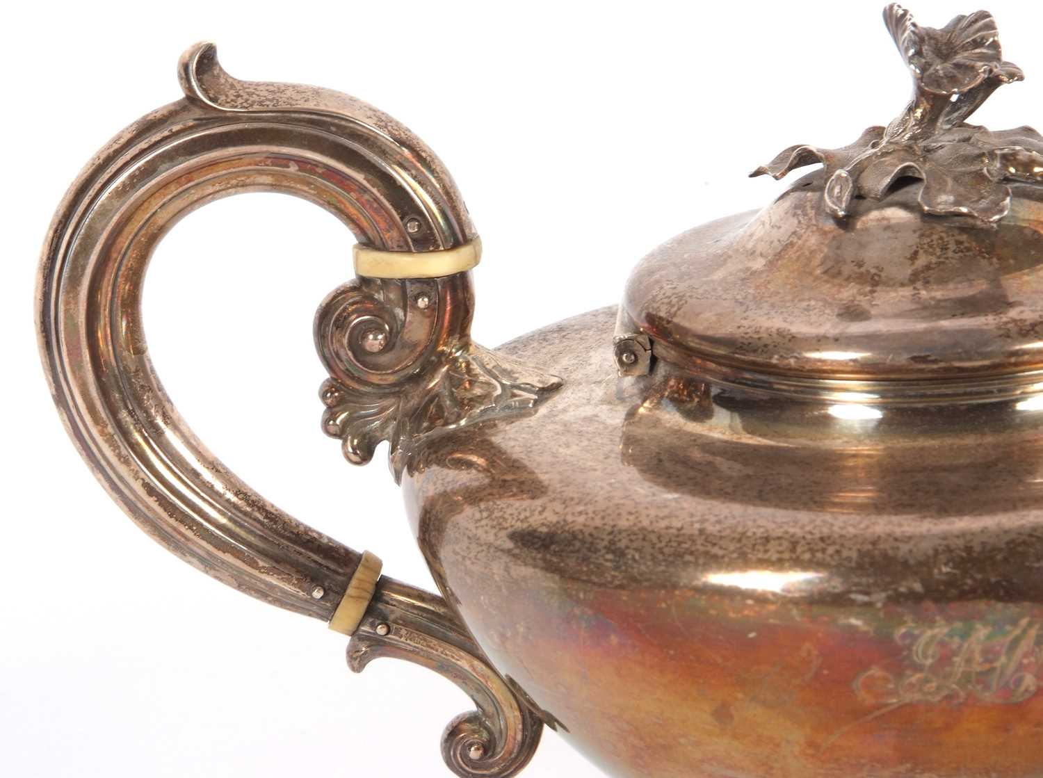 A William IV silver teapot of compressed circular plain form having a cast floral and leaf finial, - Image 3 of 5