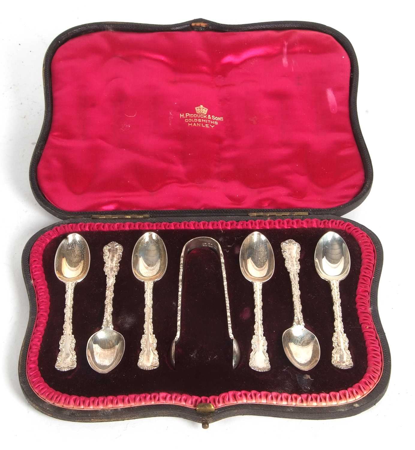 A Victorian cased set of six silver teaspoons and tongs, hallmarked for London 1898, makers mark for