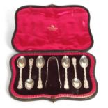 A Victorian cased set of six silver teaspoons and tongs, hallmarked for London 1898, makers mark for