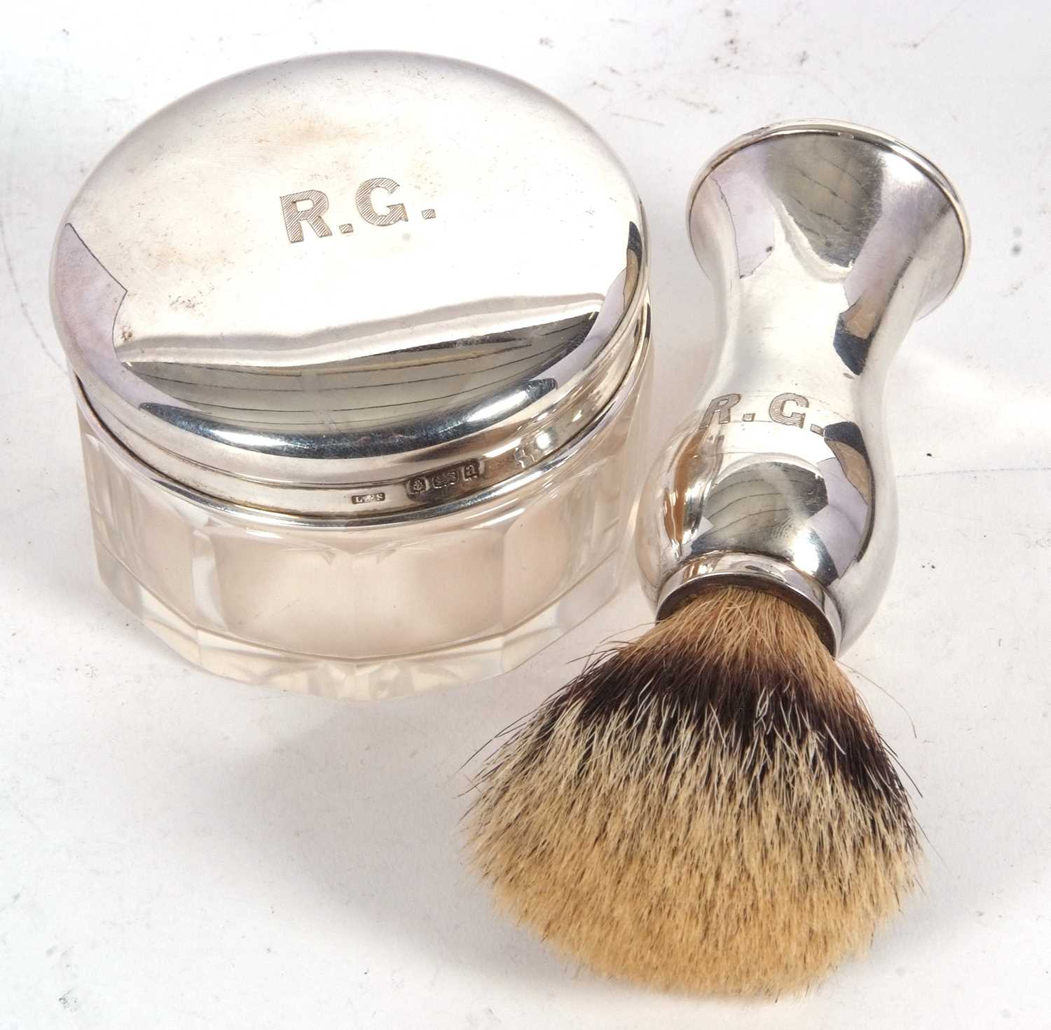 A late Victorian cased shaving silver handled brush and silver lidded pomade jar, both engraved with - Image 2 of 3