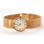 An 18ct ladies Omega wristwatch, the watch features a crown wound movement with a cream dial with