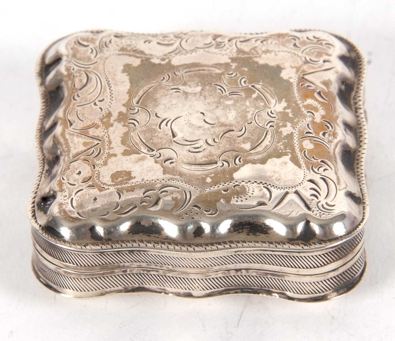 Mixed Lot: An antique Dutch silver trinket/peppermint box of cushion shape, the hinged lid chased - Image 3 of 5