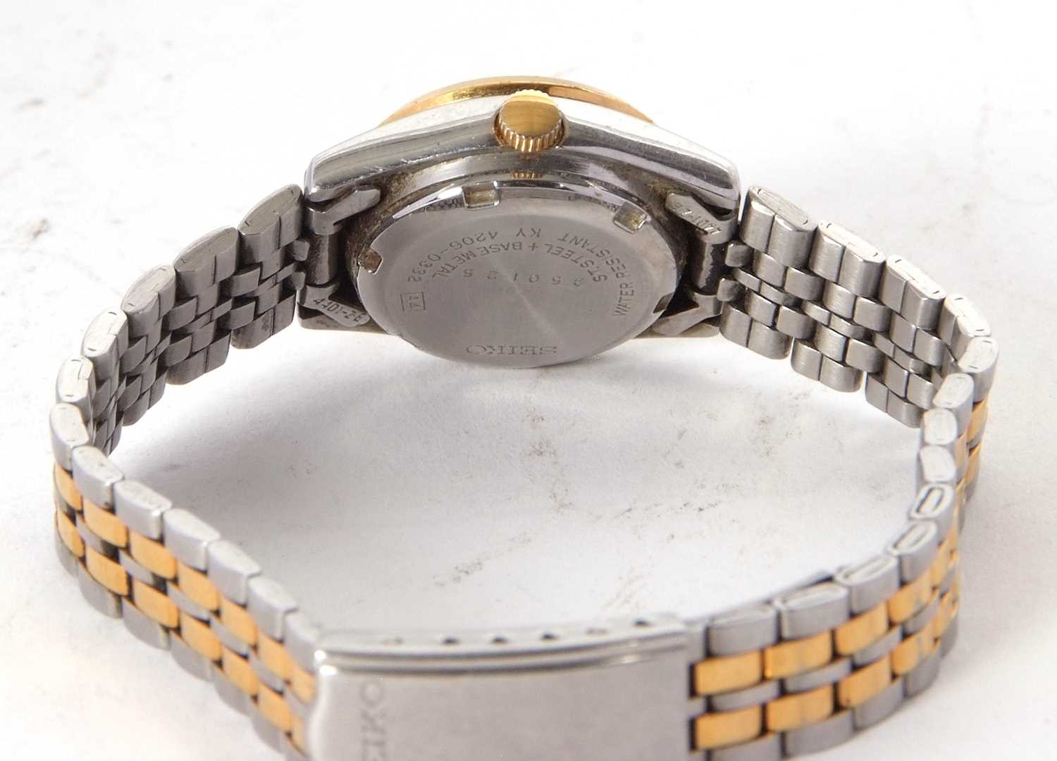 A ladies Seiko 5 automatic wristwatch, the watch has a two tone case and bracelet, a textured dial - Image 4 of 4