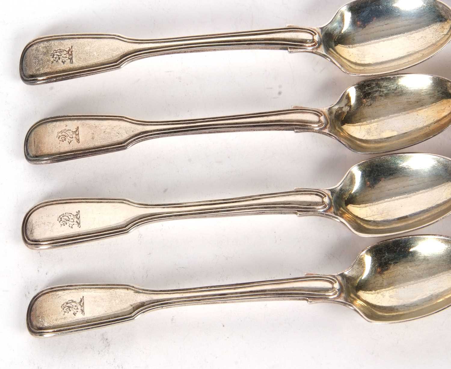 Six William IV silver teaspoons, fiddle and thread pattern, engraved with a demi-lion, London 1831 - Image 2 of 4