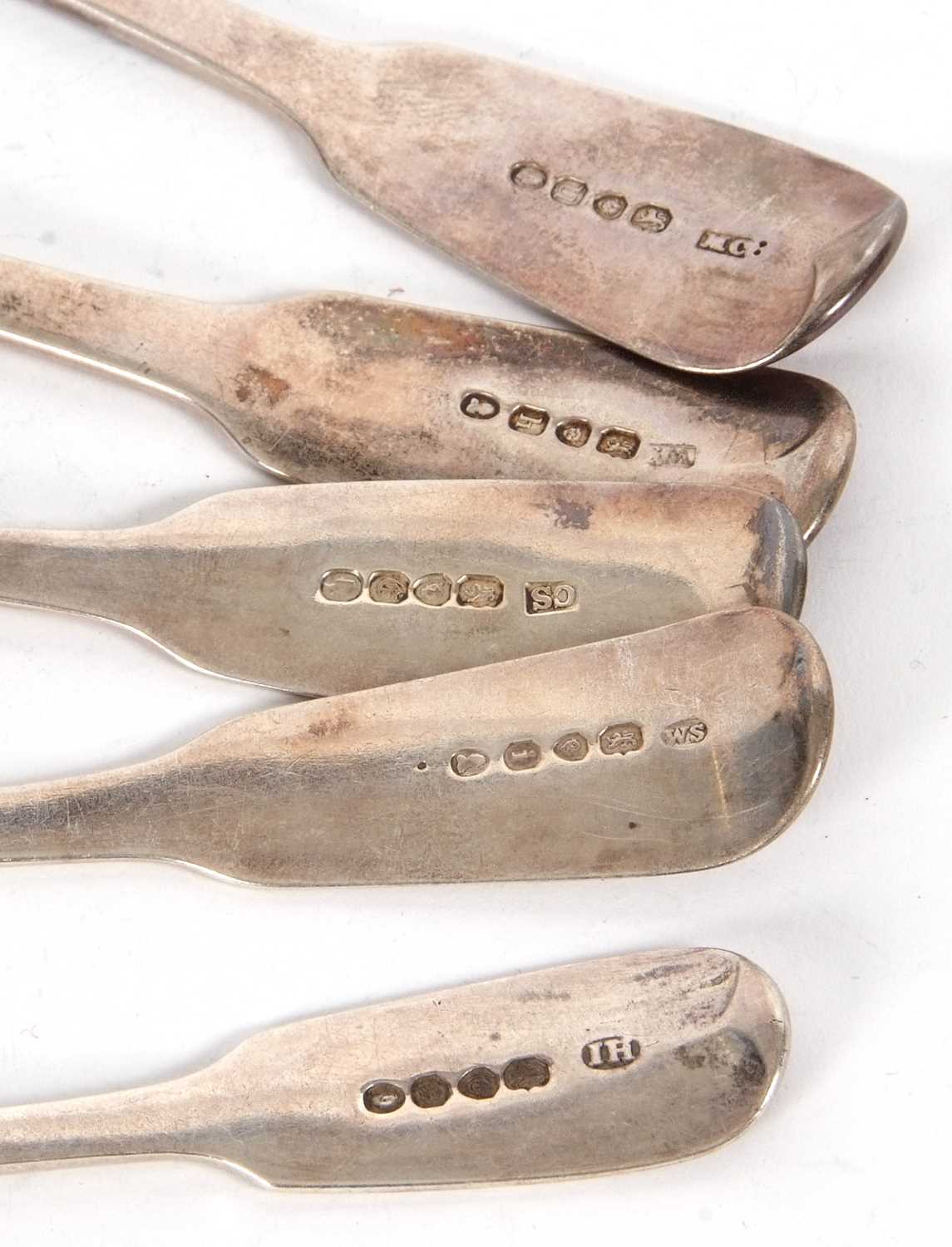 A group of four Georgian and one Victorian silver table spoon, engraved with crests and initials - Image 5 of 5