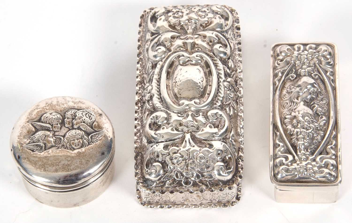 Mixed Lot: A modern white metal two part rectangular box the lid embossed with a head and