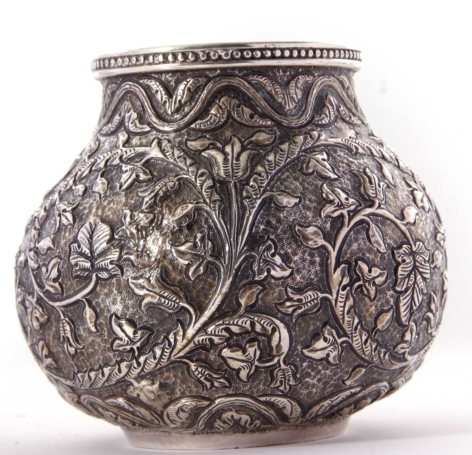 Indian Kutch white metal baluster vase having an all over scrolling foliate patern in repouse and - Image 5 of 8
