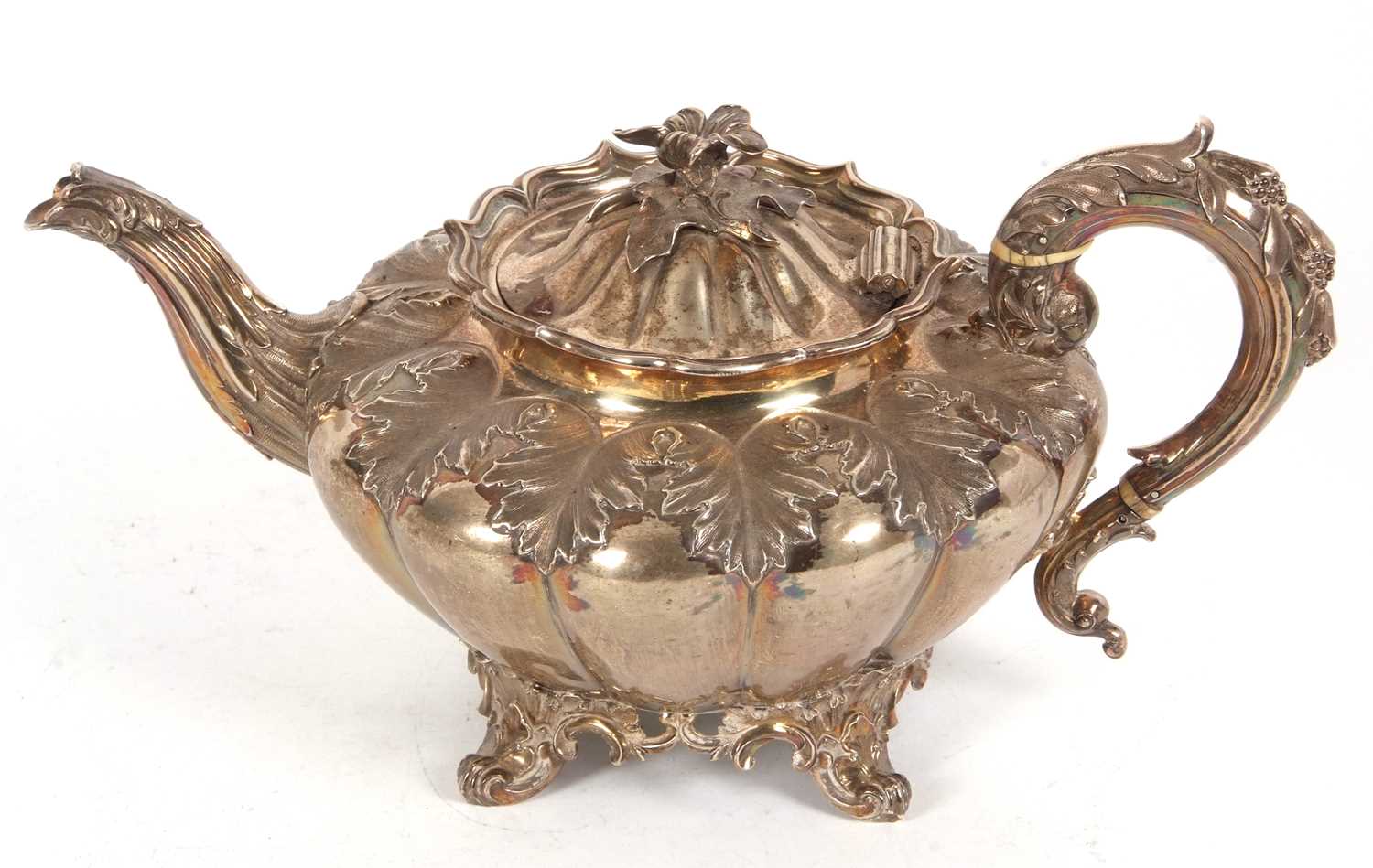 A William IV melon shaped teapot with leaf scroll handle and flower head finial, fluted body with - Image 3 of 4