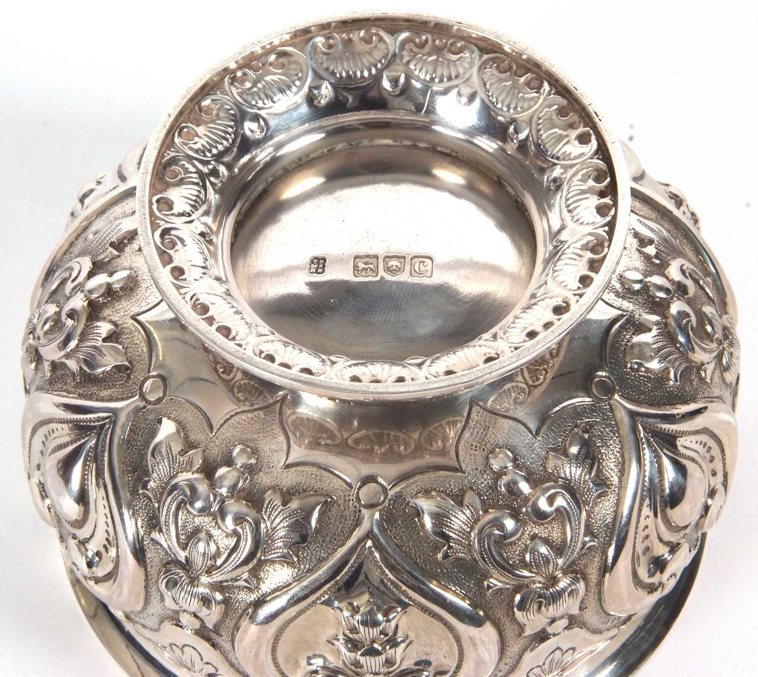 A late Victorian silver pedestal bowl of squat circular form, elaborately embossed all over with - Image 4 of 4