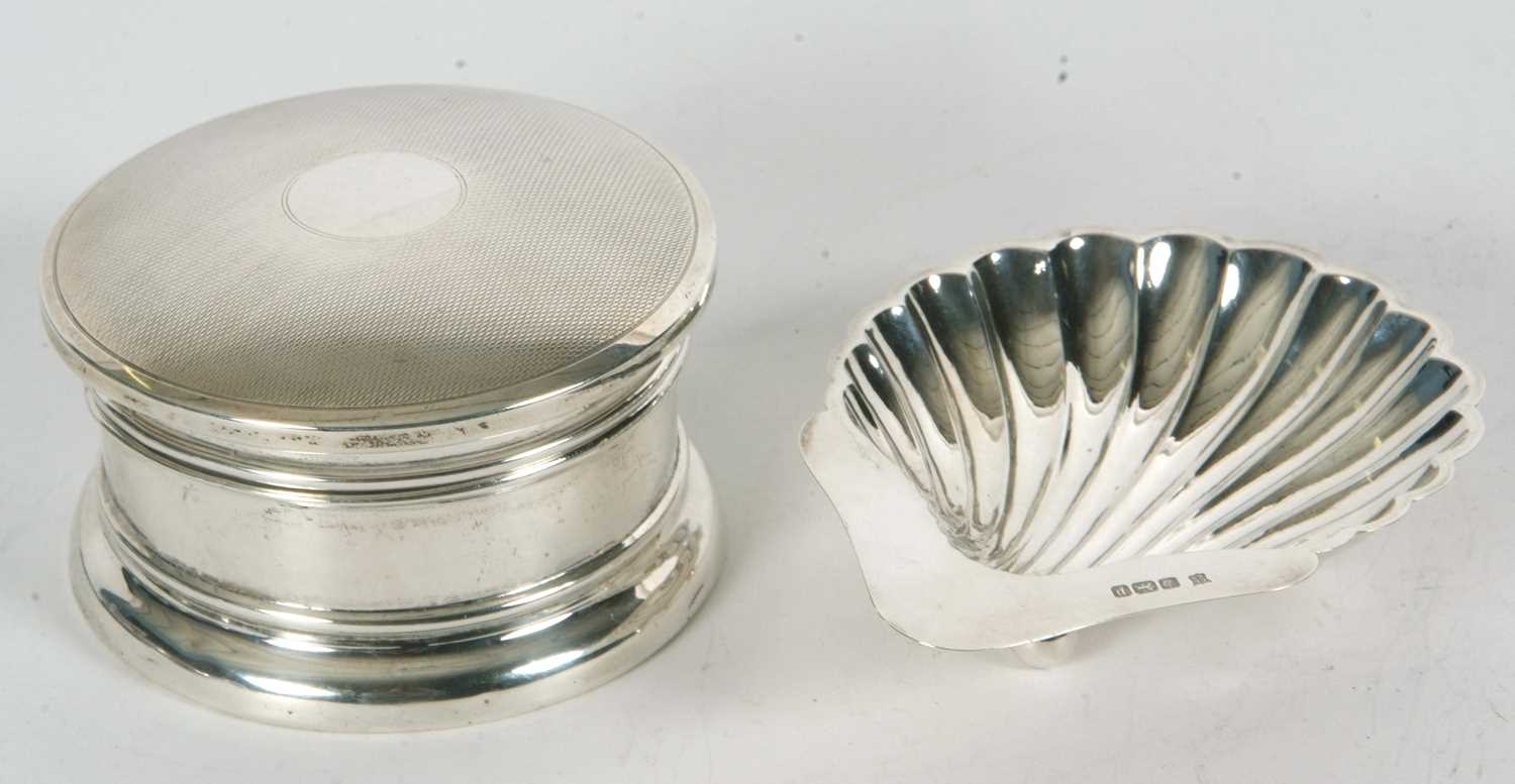 Mixed Lot: An Edwardian silver shell pattern butter dish, Sheffield 1907 together with an Art Deco