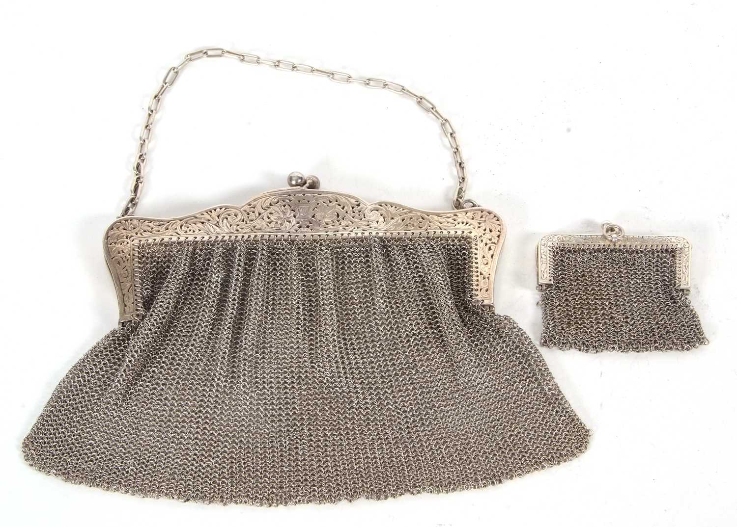 Mixed Lot: White metal ladies vintage mesh work evening bag with a floral pierced hinged frame and