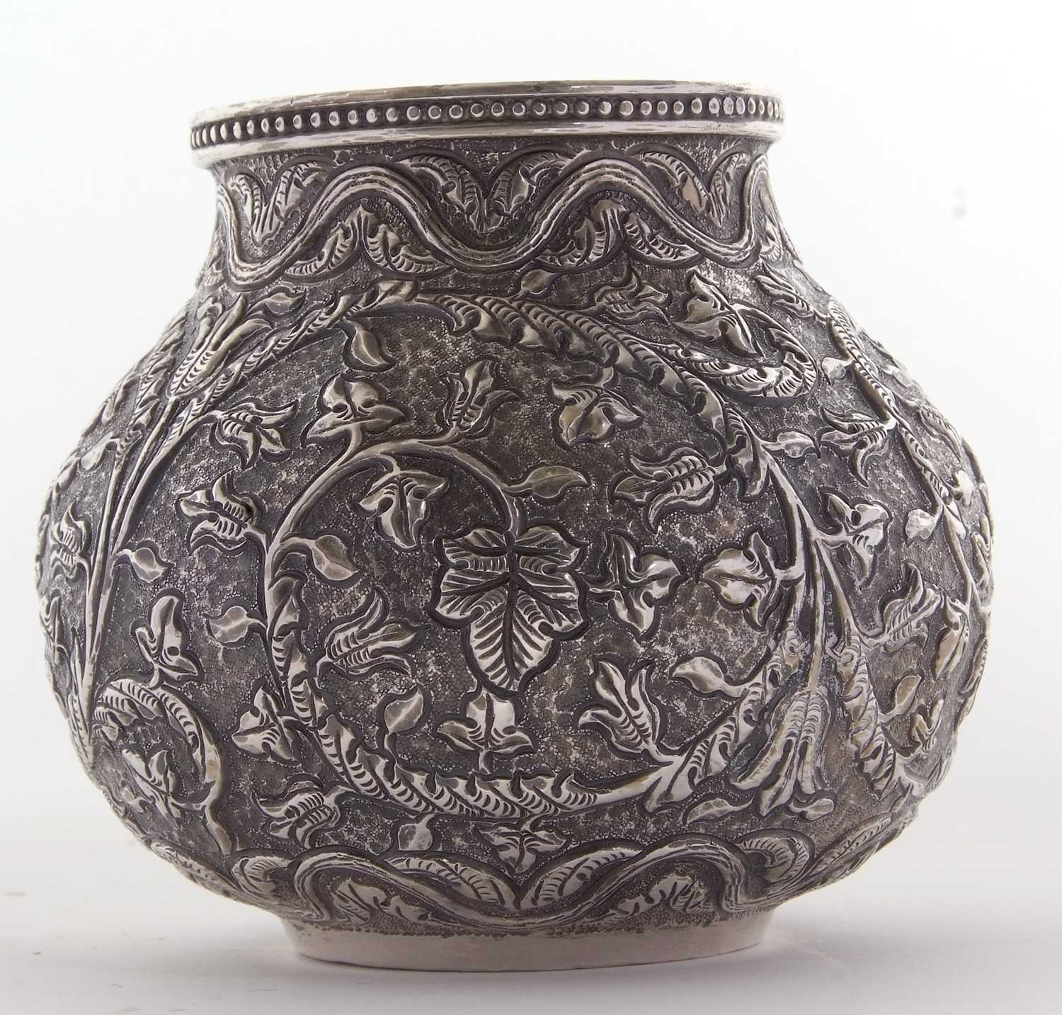 Indian Kutch white metal baluster vase having an all over scrolling foliate patern in repouse and - Image 3 of 8