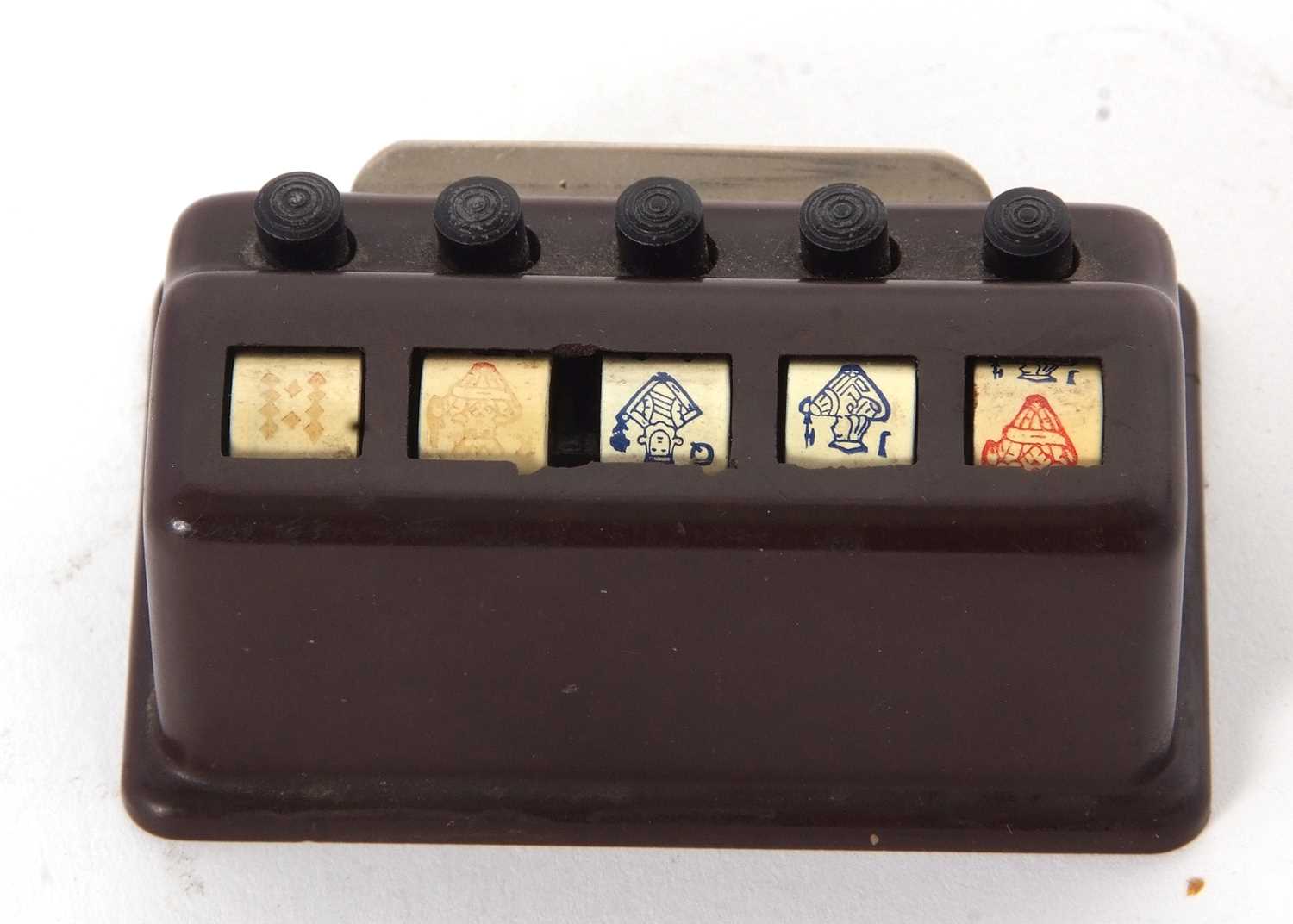 A vintage poker dice game, a push button rotating system featuring five hand painted poker die - Image 4 of 5