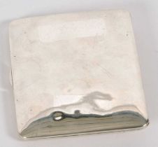 A Siamese white metal cigarette case, the front elaborately embossed with scrolls around a central