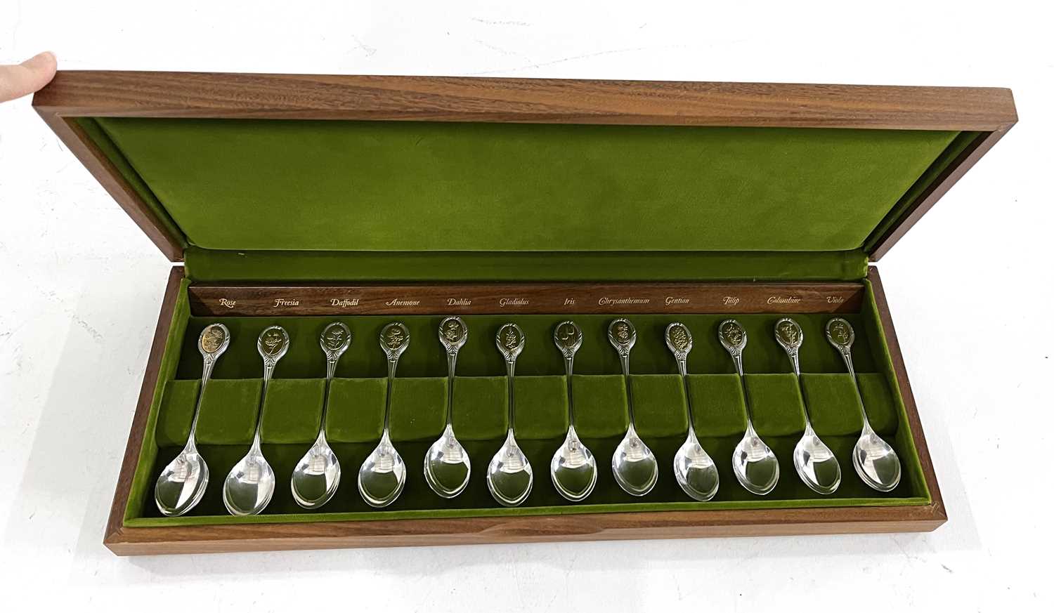 A set of 12 Silver Royal Horticultural Society Spoons. Hallmarked for Sheffiled 1973 John Pinches