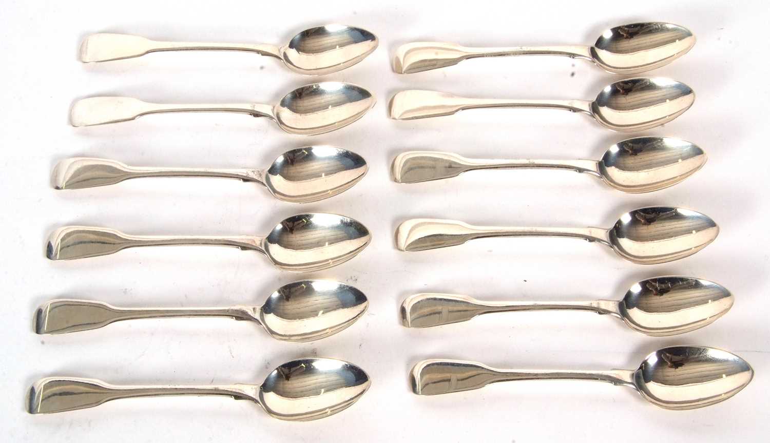 A set of twelve George IV fiddle pattern teaspoons, hallmarked 1829, makers mark William Bateman II,