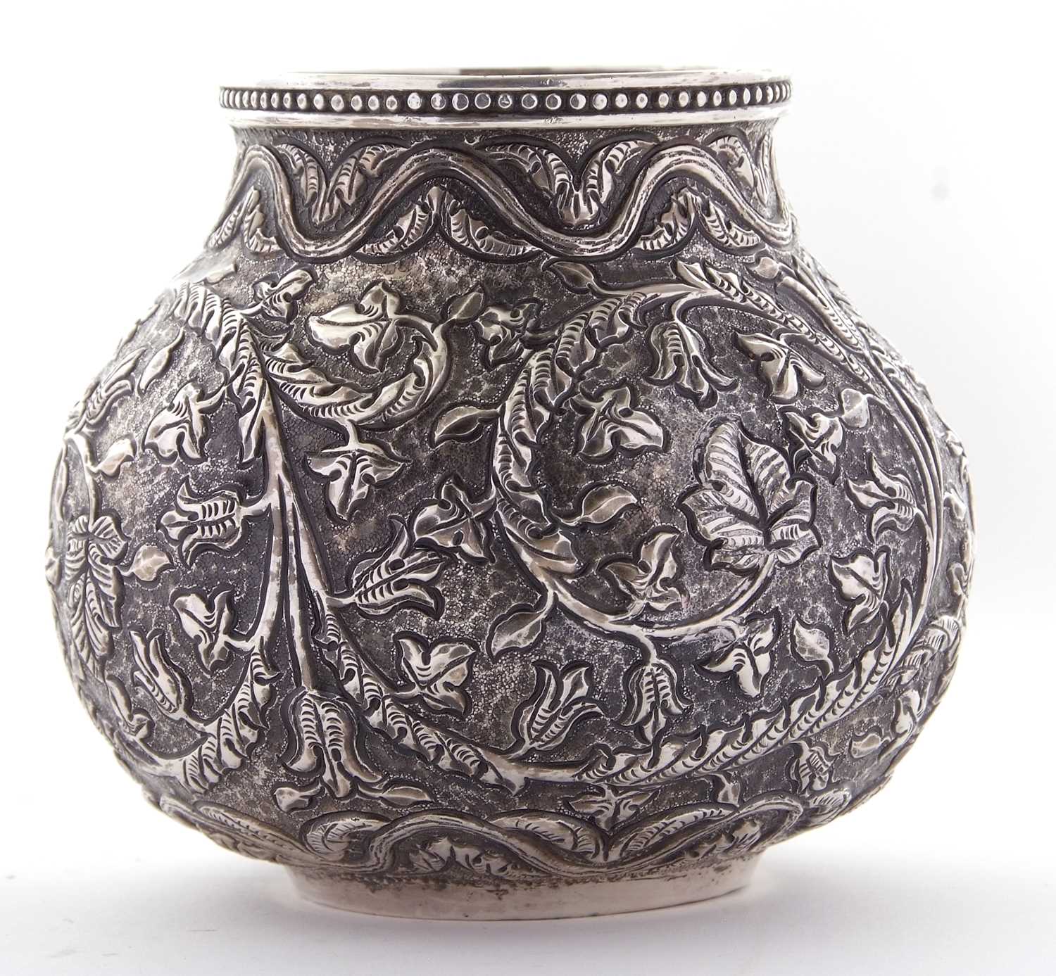 Indian Kutch white metal baluster vase having an all over scrolling foliate patern in repouse and - Image 6 of 8